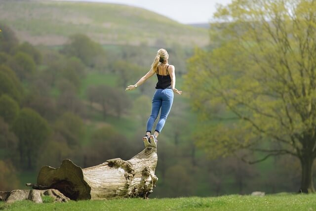 a fulfilled woman in the open air