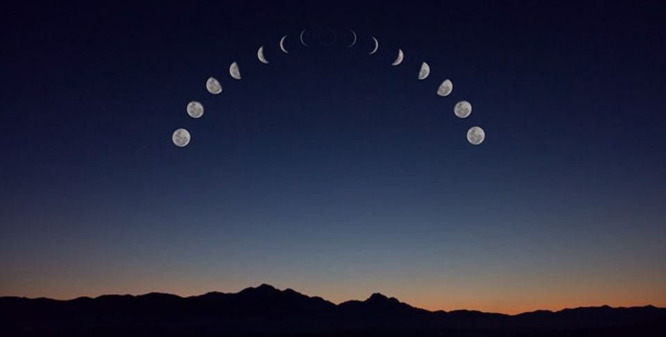 different phases of the moon in the sky